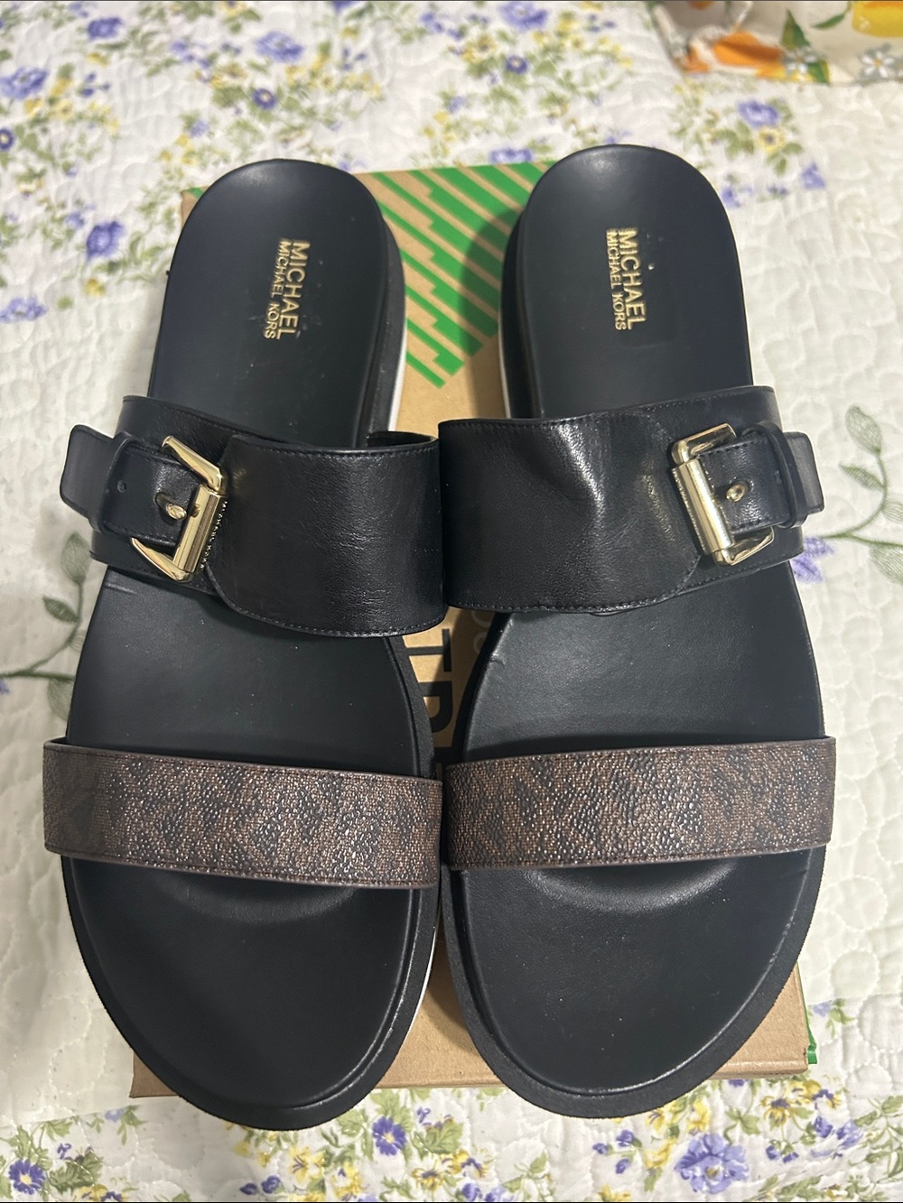MICHAEL Michael Kors Black Slides with Brown Logo Strap and Gold Buckles